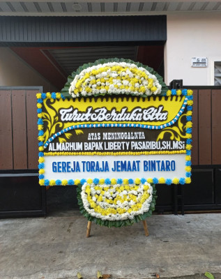 Papan Bunga Duka di Tumpung Ulung